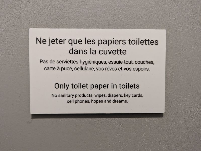Sign in toilet stall